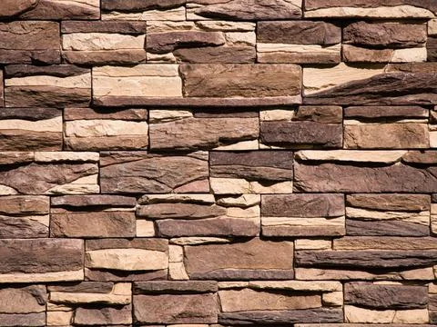 Brown brick wall. Brick wall as background Stock Photos