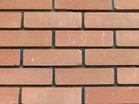 Brown brick wall close up seamless background, space for text 写真素材