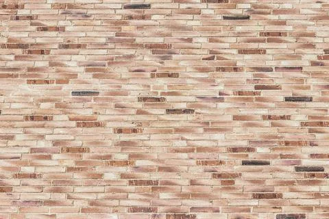 Brown brick wall with a rectangular pattern Stock Photos