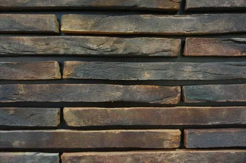 Brown brick wall texture background Stock-Fotos