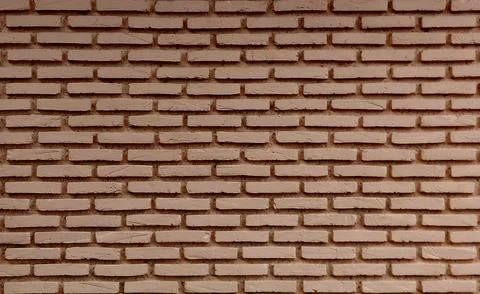 Brown brick wall texture background, seamless pattern. Stock Photos