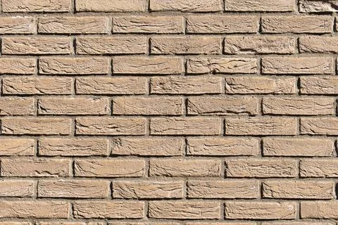 Brown brick wall texture background closeup of horizontal masonry pattern Stock Photos