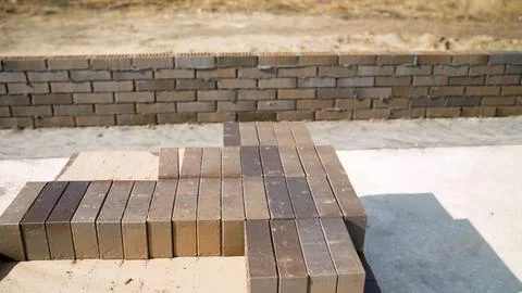 Brown bricks on a construction site, building a private house. Concept of b.. Foto stock