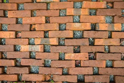 Brown bricks decorated in pattern on floor Stock Photos