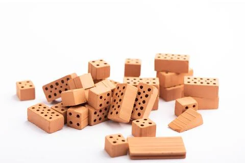 Brown bricks on a white background. Construction Materials Stock Photos