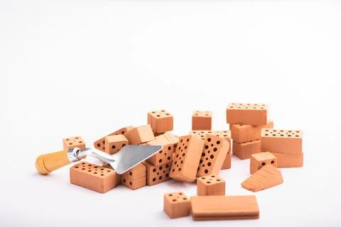 Brown bricks on a white background. Construction Materials Stock Photos