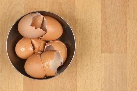 Brown broken eggshells Stock Photos