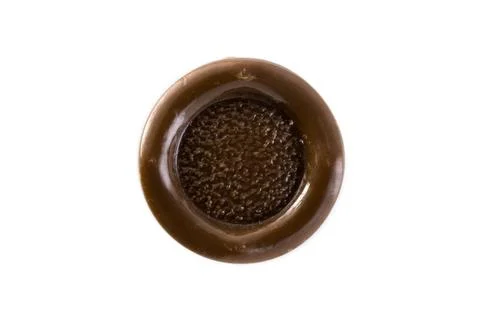 Brown button on a white background Stock Photos