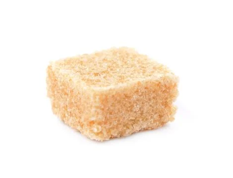 Brown cane sugar cubes isolated on white background Stock Photos