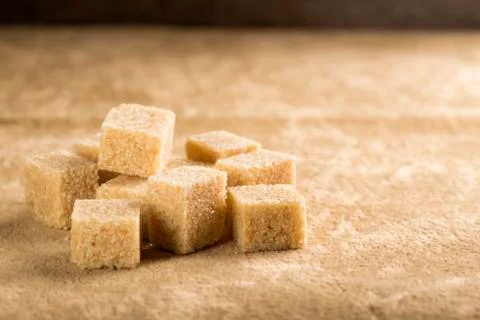 Brown cane sugar cubes Stock Photos