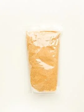 Brown cane sugar Stock Photos