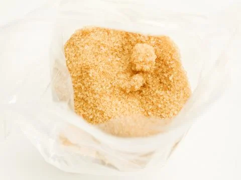 Brown cane sugar Stock Photos