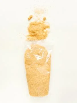 Brown cane sugar Stock Photos