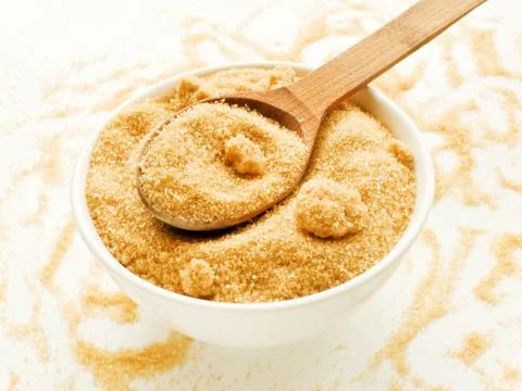 Brown cane sugar Stock Photos