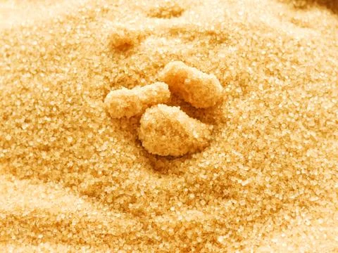 Brown cane sugar Stock Photos