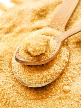 Brown cane sugar Stock Photos