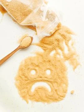 Brown cane sugar Stock Photos