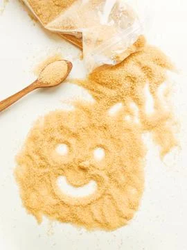 Brown cane sugar Stock Photos