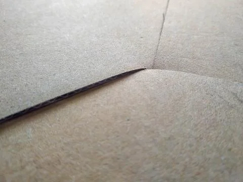 Brown cardboard box texture background macro close-up view 库存照片