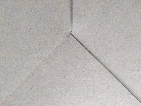 Brown cardboard box texture background macro close-up view Stock Photos