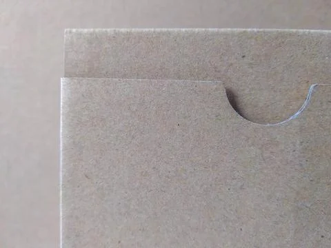 Brown cardboard box texture background macro close-up view Фото