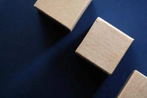 Brown Cardboard Cubes Stock Photos