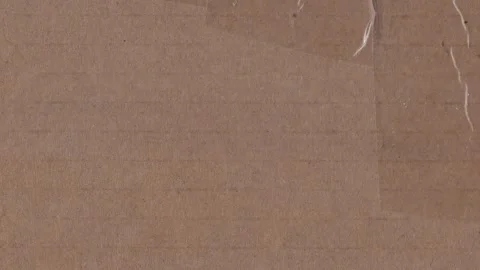 Brown cardboard surface with tape background Stock Footage 328135641