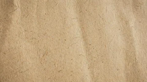 Brown cardboard texture background closeup. Fotos Stock
