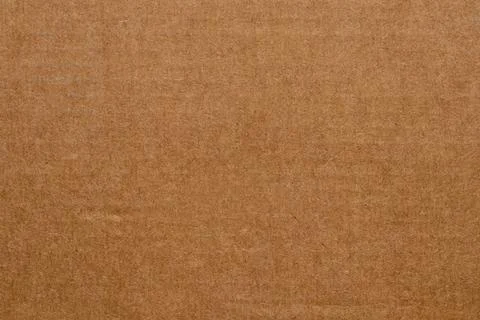 Brown cardboard texture close-up on the topic of paper background for desig.. Stock Photos