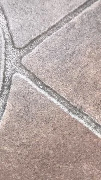 Brown ceramic floor tile texture with white grout lines Foto stock