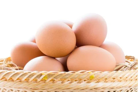 Brown chicken eggs in basket Stock Photos