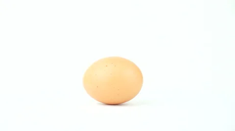 Brown chicken eggs on white background. Rotating 360 degrees on empty background Stock Footage 41811561
