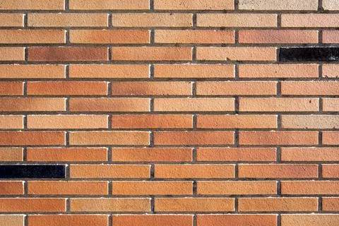 Brown clinkered wall Stock Photos