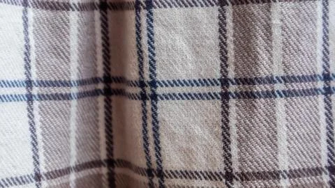 Brown cloth texture with gingham as a background Stock Photos