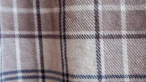 Brown cloth texture with gingham as a background Stock Photos