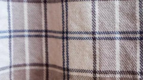 Brown cloth texture with gingham as a background Stock Photos