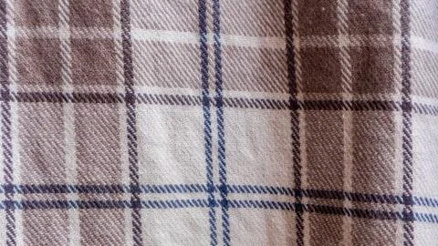 Brown cloth texture with gingham as a background Stock Photos