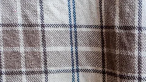 Brown cloth texture with gingham as a background Stock Photos