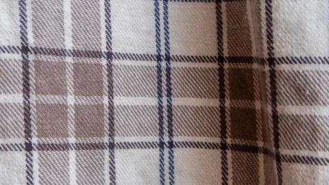 Brown cloth texture with gingham as a background Stock Photos