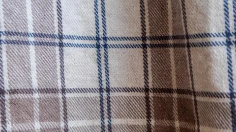 Brown cloth texture with gingham as a background Stock Photos