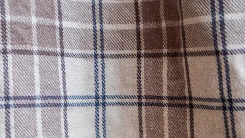 Brown cloth texture with gingham as a background Stock Photos