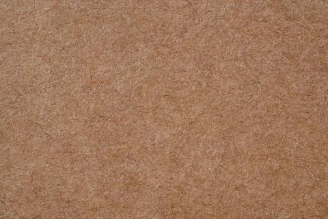 Brown coarse paper macro background Stock Photos