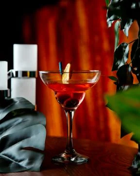 Brown cocktail on the table Stock Photos