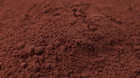 Brown cocoa powder falling down close up Stock Footage 268851958