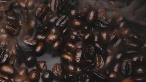 Brown coffee beans are roasted Stock Footage 117398476