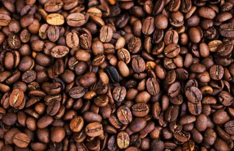 Brown coffee beans, background texture Stock Photos