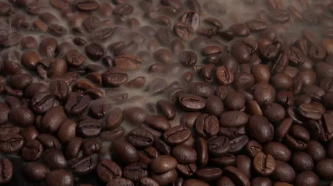 Brown Coffee beans with steam loop video HD Stock Footage 59305329