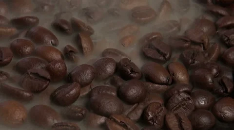 Brown Coffee beans with steam loop video HD Stock Footage 59305355