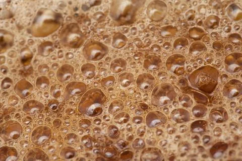 Brown coffee bubbles Stock Photos