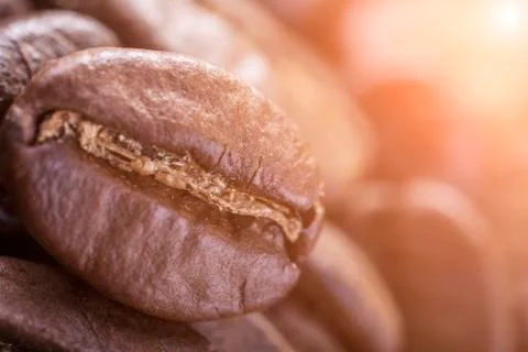Brown coffee closeup background. light effect in the corner Stock Photos